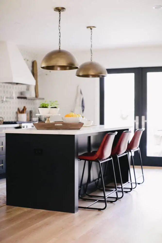 Kitchen Remodel with Dark Island and Brass Pendant with Leather Stools
